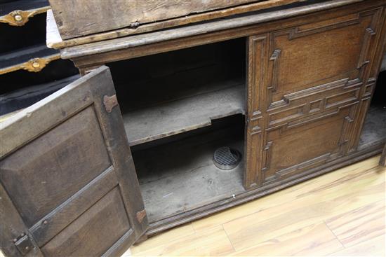 An 18th century French low cupboard 6ft 2in.